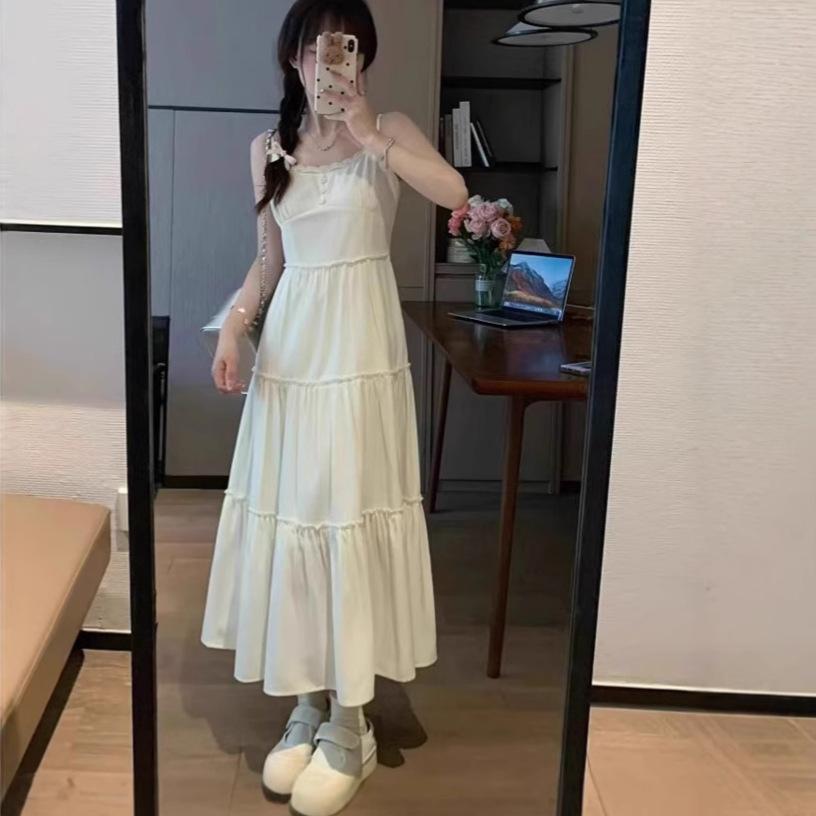 Cream white moonlight summer new seaside vacation temperament waist medium and long skirt gentle suspender dress