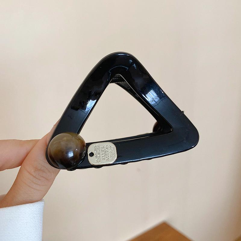 

Acrylic hollow triangle geometric grab clip fashion back head disc hair temperament hairpin
