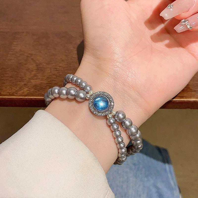 Korean Retro Pearl Titanium Steel Women's Bracelet - High-End Ins Style Beaded Bangle for Couples