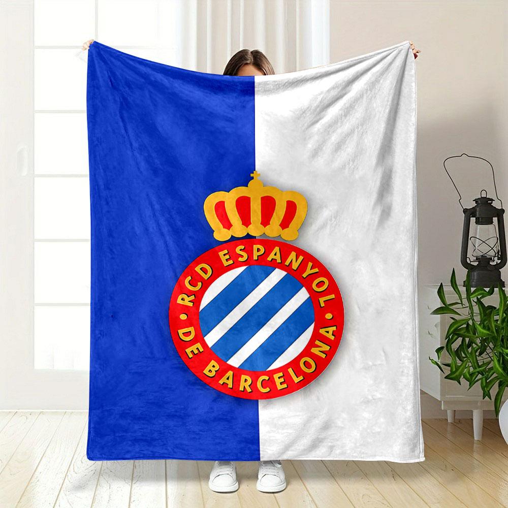 A blue and white striped crest with a red circular border and gold crown. for all seasons blanket lunch break throw gift