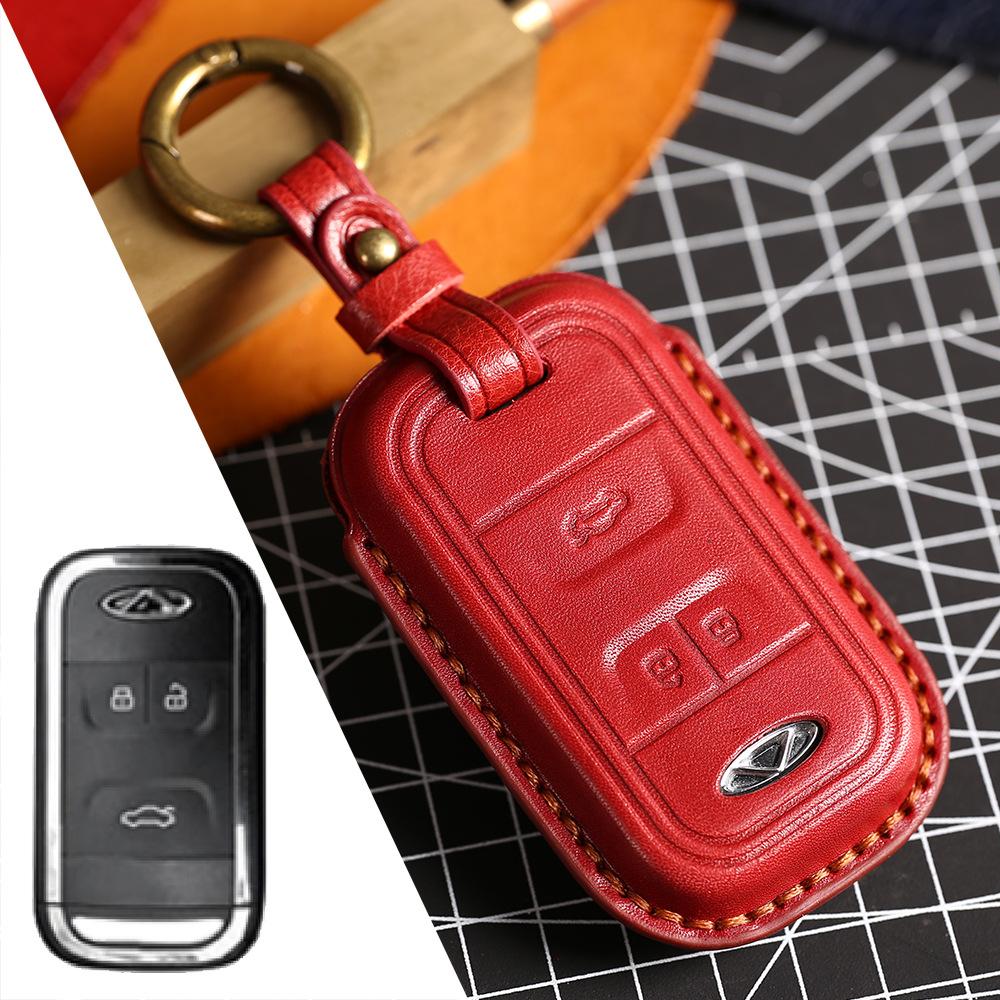 

The key cover is suitable for the new Tiggo 8 real cowhide car remote control protective case buckle. красный