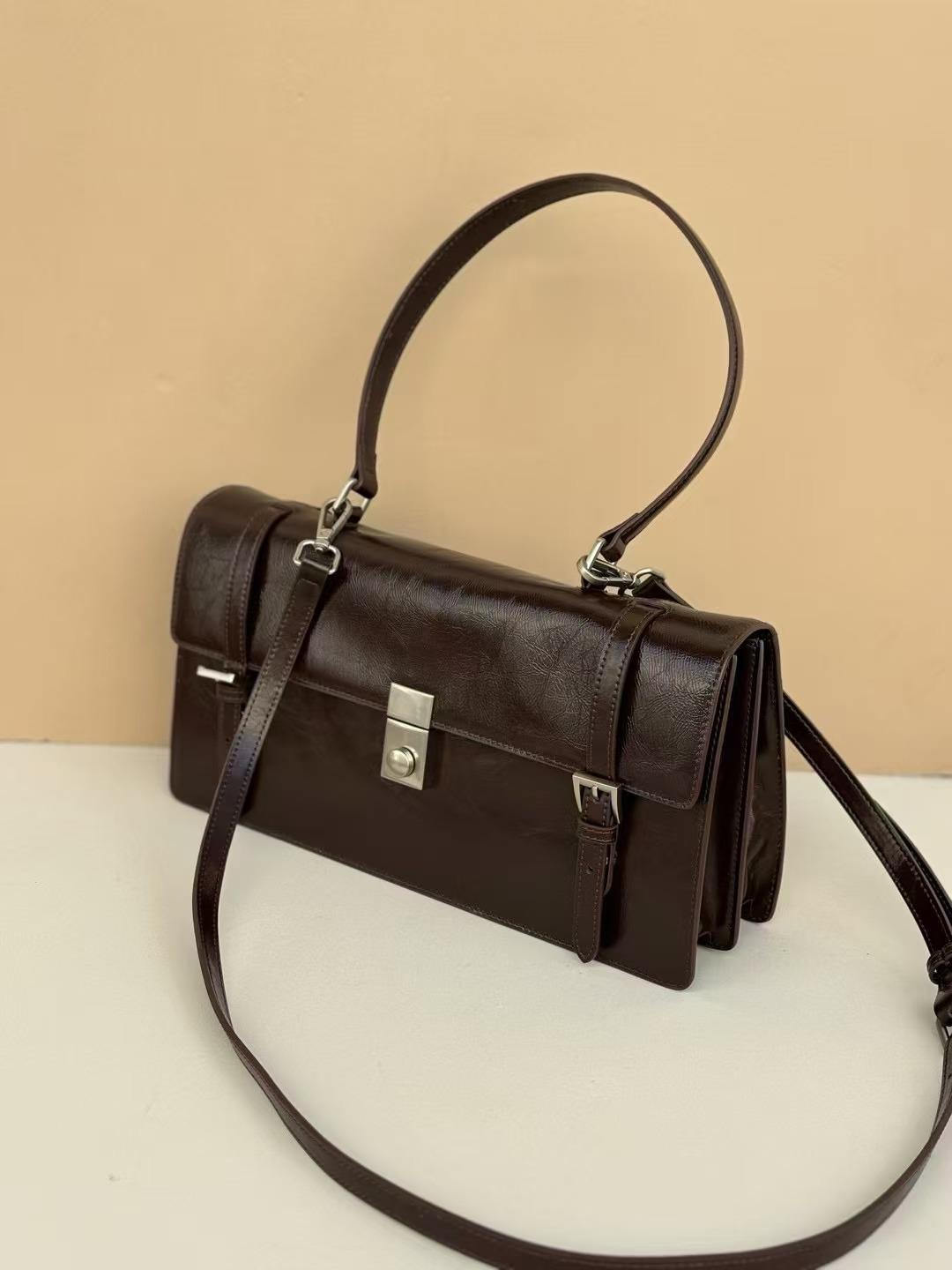 Factory New High-end Leather One-shoulder Cross-body Bag Korean Niche French Stick Retro Women s Handbag 33x9x17 коричневый