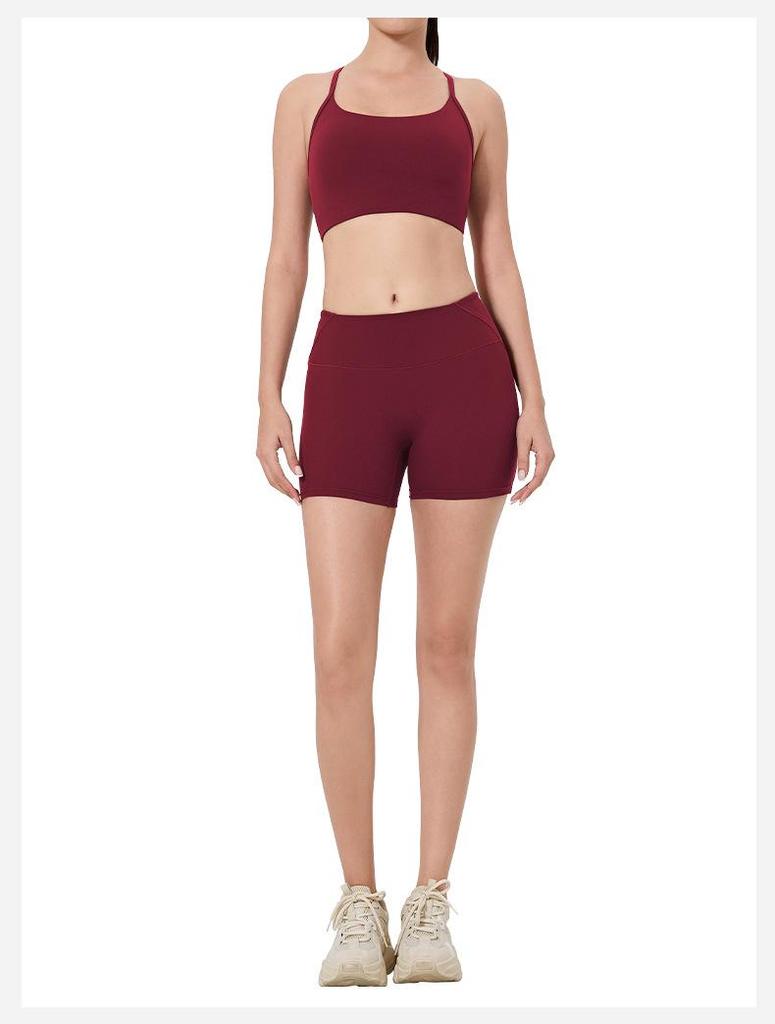 Women's High-Waist Fitness Set: Sports Bra with Pads, Beautiful Back Design, and Three-Point Peach Lift Shorts for Yoga and Pilates.