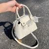 Lace Bow Boston Bag, A Textured and Fashionable Crossbody Bag, A Commuter Shell Bag