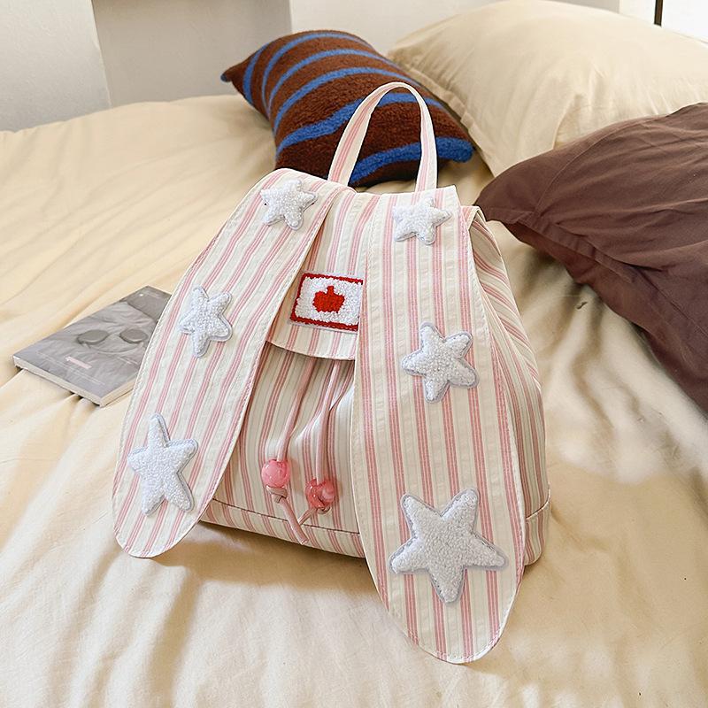 Cute rabbit ear backpack female junior high school student vertical stripe contrasting color star bag high value student travel small backpack
