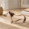 Open-Frame Wiener Dog Sculpture In Metal with a Mottled Aged-Look Finish for Indoor Cabinets, Shelves, and Desktops