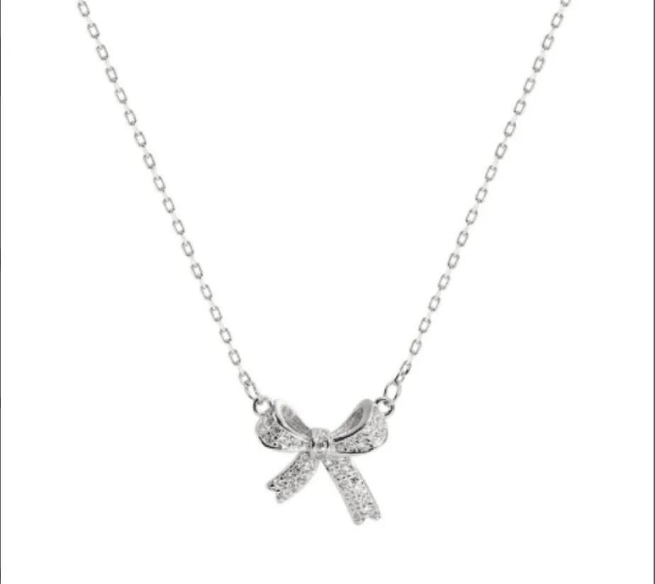 

Exquisite Copper Inlaid Zirconia Bow Pendant Necklace for Women Girls Sweet Clavicle Chain Bridal Wedding Jewelry Accessories серебряный