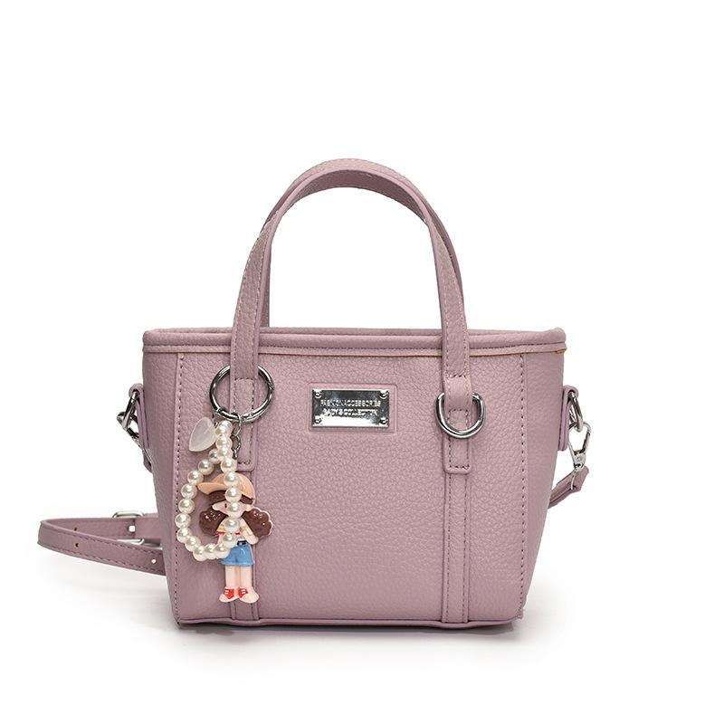 Spring hot sale lychee pattern high-end portable bucket bag Korean version casual small fresh temperament versatile messenger women's bag