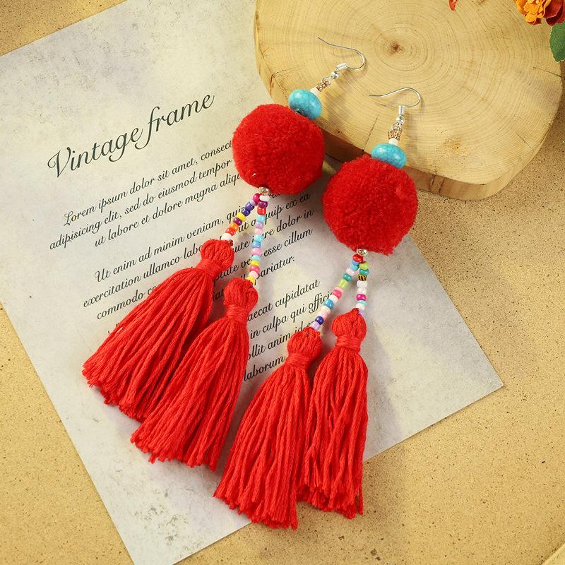 Bohemian retro pom-pom fringed earrings women's vacation long temperament niche personality earrings