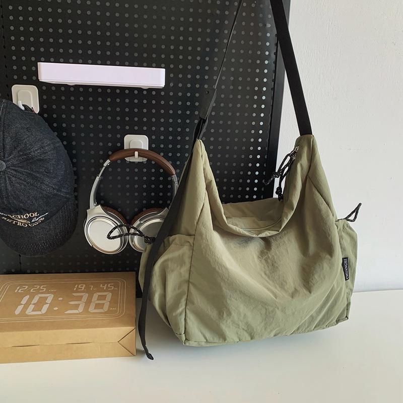 Повседневная нейлоновая сумка через плечо для мужчин и женщин чёрный — фото 11