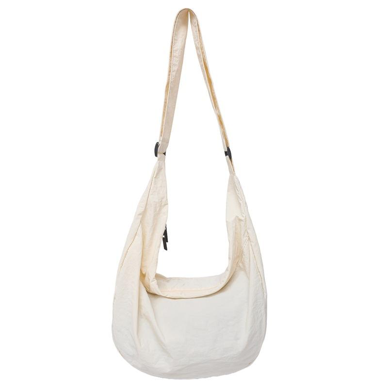 Lazy wind canvas bag new simple dumpling bag versatile women's shoulder bag large capacity commuter messenger bag