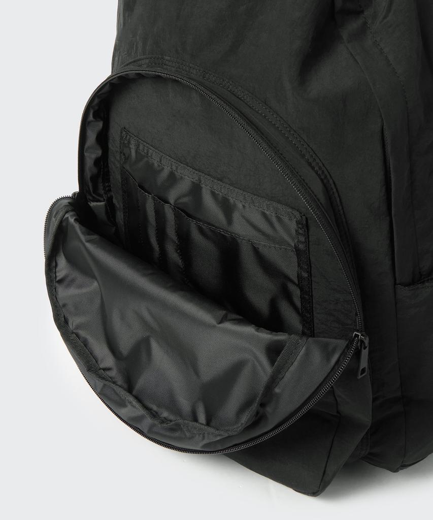 Musinsa Standard Crinkle Round Pocket Backpack [Black]