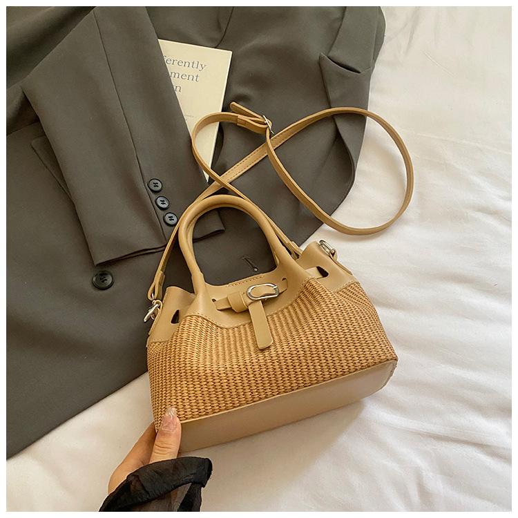 Summer Hand Carry Straw Bucket Bag Women 2025 New Fashion Simple Casual Woven Bag Niche Design Messenger Bag