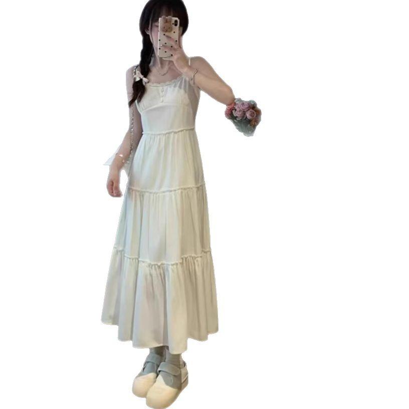 Cream white moonlight summer new seaside vacation temperament waist medium and long skirt gentle suspender dress