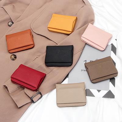 Portefeuille court pour femme en cuir de vachette pure 2025 cuir véritable japonais transfrontalier petit portefeuille multi-fonctionnel sac à monnaie femmes