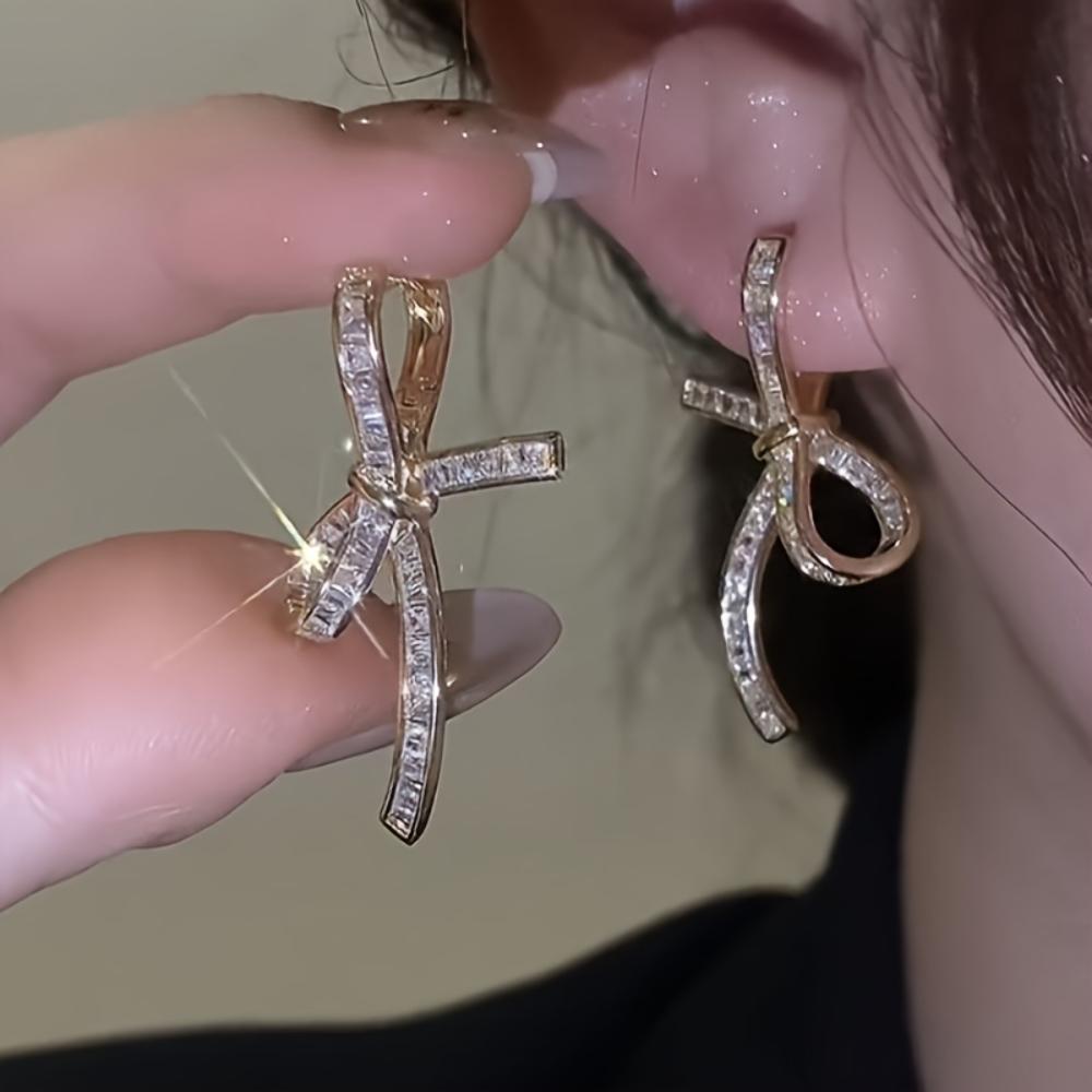 

Серьги-бантики неправильной формы, клипсы, легкая роскошь, нишевый дизайн, индивидуальность, универсальные серьги золотой
