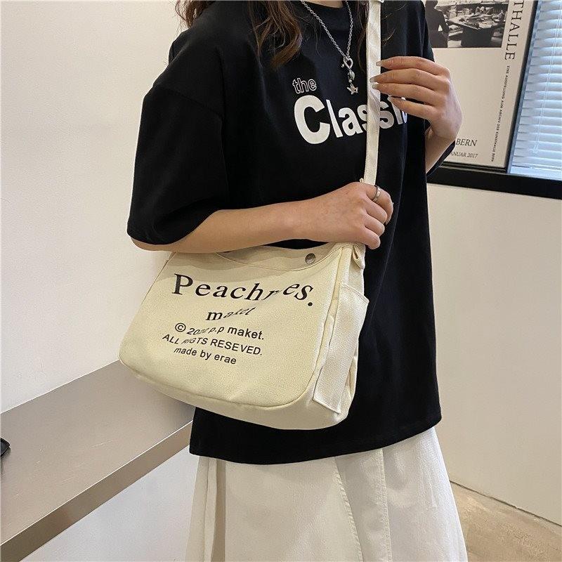 Stylish Korean Vintage Canvas Tote Bag For Women With Spacious Capacity And Trendy Lettering In Cream Brown Or Black