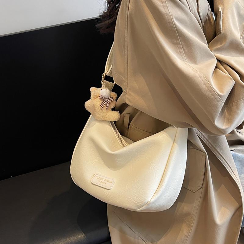 White large-capacity commuter bag women s new soft leather sports style dumpling bag French underarm bag