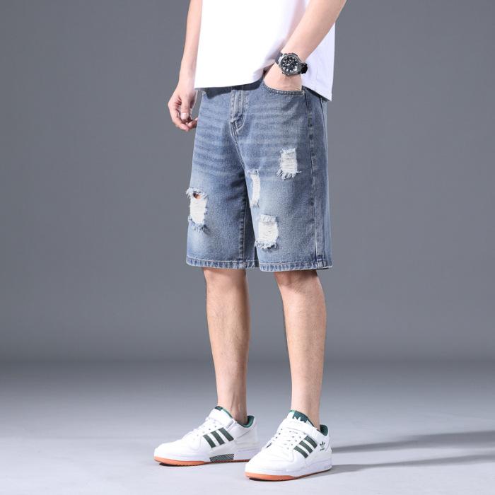 

Мужские джинсовые шорты летние тонкие свободные пятиточечные бриджи с рваными деталями 38 синий