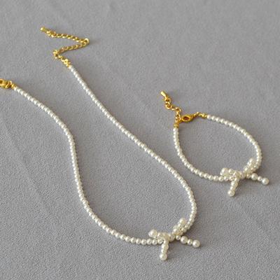French Niche Elegant and Bright Imitation Shijia Pearl Bow Shape Simple Temperament Short Necklace Choker Woman