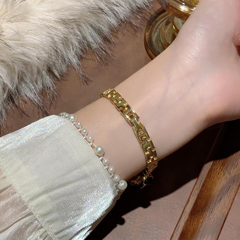 Wykwintny damski zegarek bransoletka z pozłacanego kwarcu z kamieniem naturalnym