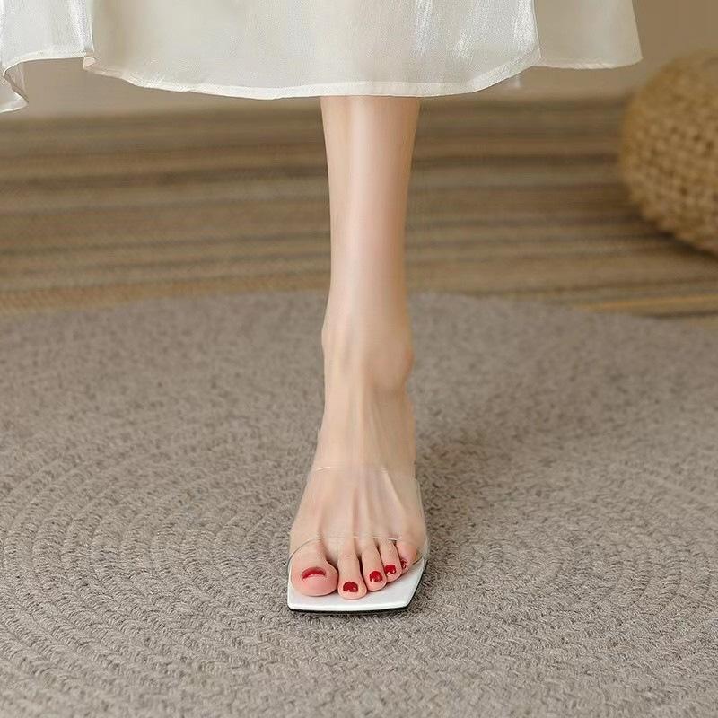 

Women s shoes in the summer of 2025, the new Korean version of transparent sandals, women s thin heels, one-word outer wear, high-heeled cool slippers 34 белый