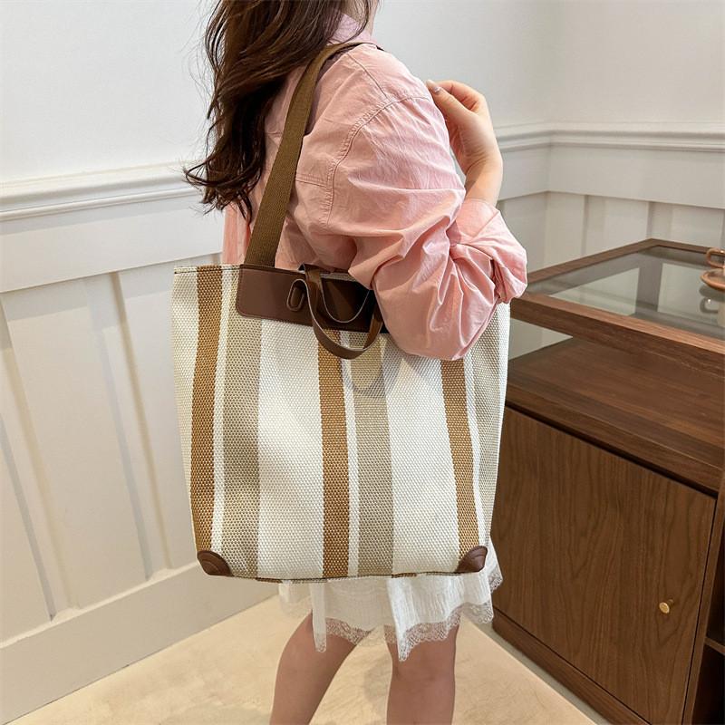 Contemporary Unisex Tote Bag With Dual Shoulder Straps Ideal For Daily Use And Shopping