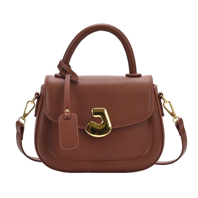 

Fashion handbag 2025 spring new versatile solid color messenger bag small square bag women коричневий