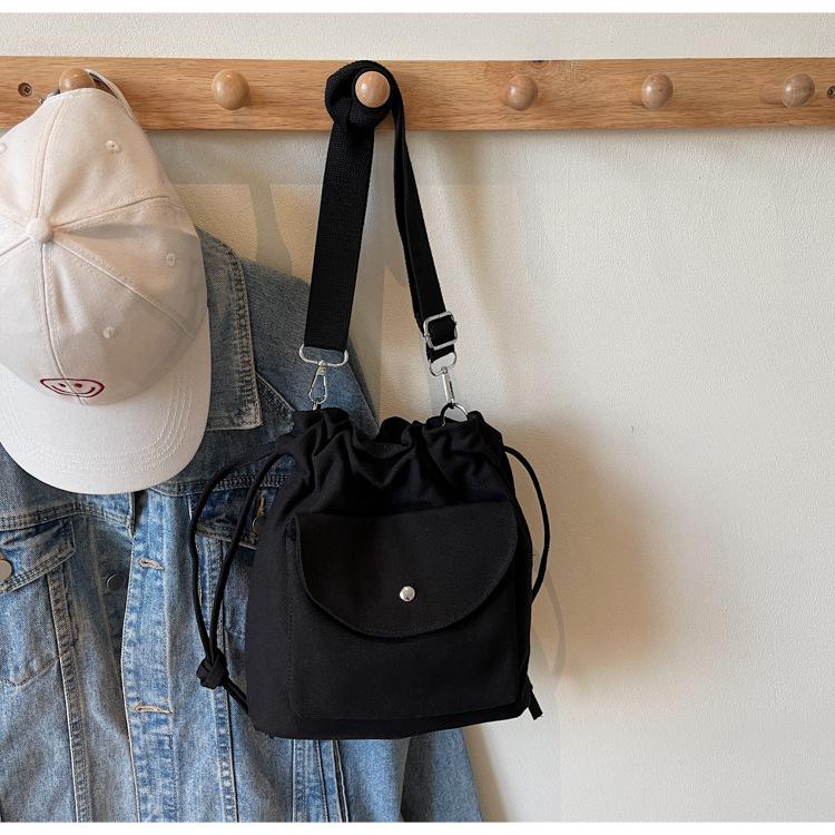 Canvas Bag Women's Spring and Summer New Niche Drawstring Shoulder Messenger Bag Pleated Bucket Bag