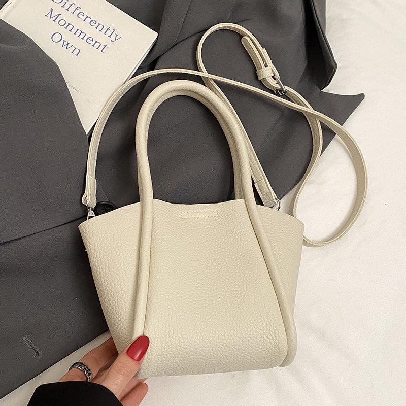 2025 New Niche Simple High-end Korean Version Vegetable Basket Bag Women's Casual Versatile Fashion Messenger Mother and Child Bag