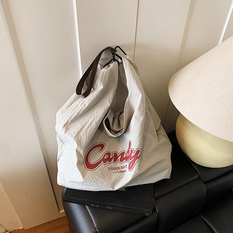 Casual large-capacity canvas bag literary niche underarm bag women's 2025 new letter tote bag shopping bag bag
