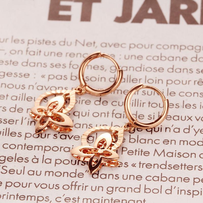 Exquisite Russian Purple Gold Shining Butterfly Ear Buckle Simple Exquisite Rose Gold Water Drop Hollow Earrings Women (pair of rose gold plated)