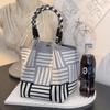 Versatile Large Knitted Handbag with Hollow-Out Flower Pattern