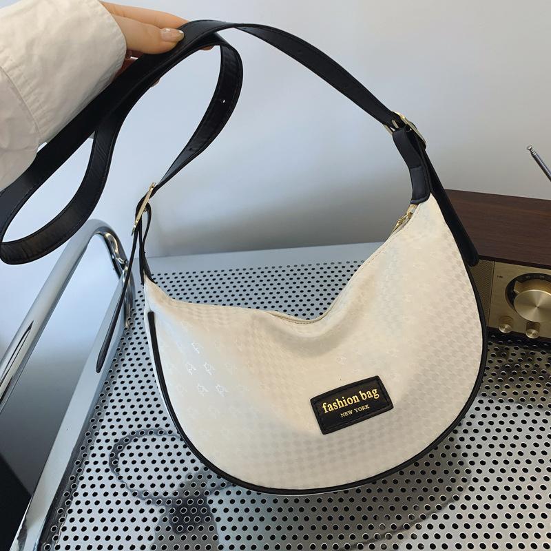 

Simple 2024 summer new foreign style messenger bag fashion shoulder bag trend summer simple fashion bucket bag бежевий