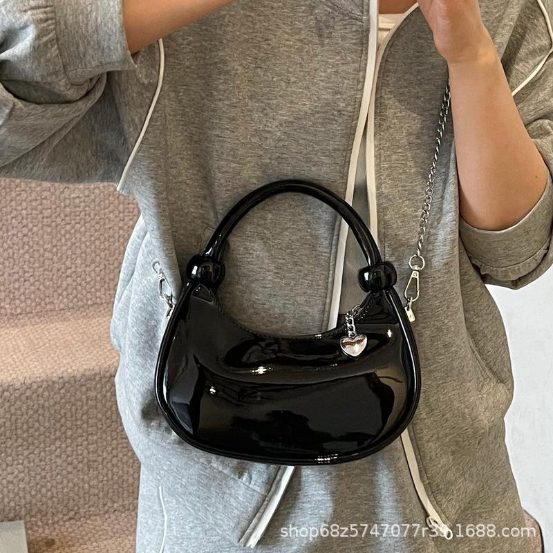 Hand-held Fashion Trend Dumpling Bag Women's 2025 New Simple and Versatile Patent Leather Shoulder Bag Niche Design Crossbody Bag