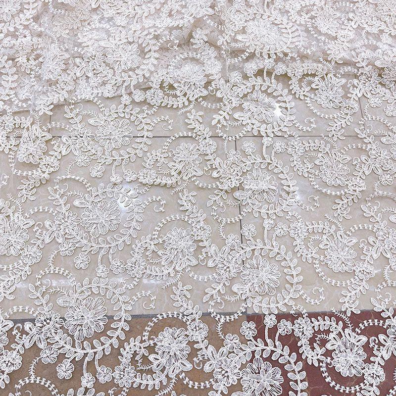 Embroidered Lace Fabric with Flower-like Patterns Suitable for Wedding Dresses Formal Gowns and Designer Clothing Fabrics