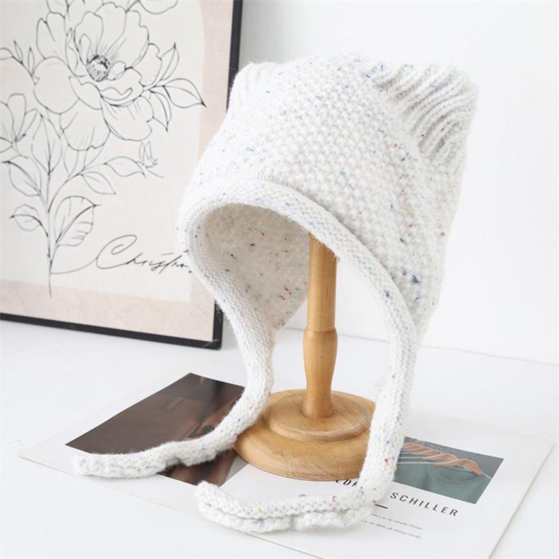 Winter new women's ear protectors headgear warm lace-up Lei Feng hat student solid color simple knitted hat