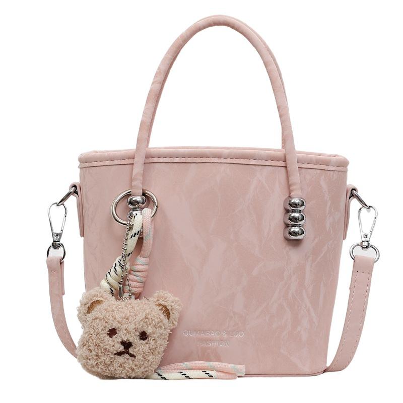 Solid color casual sweet bucket bag women's new solid color fashionable trendy messenger bag commuter simple handbag
