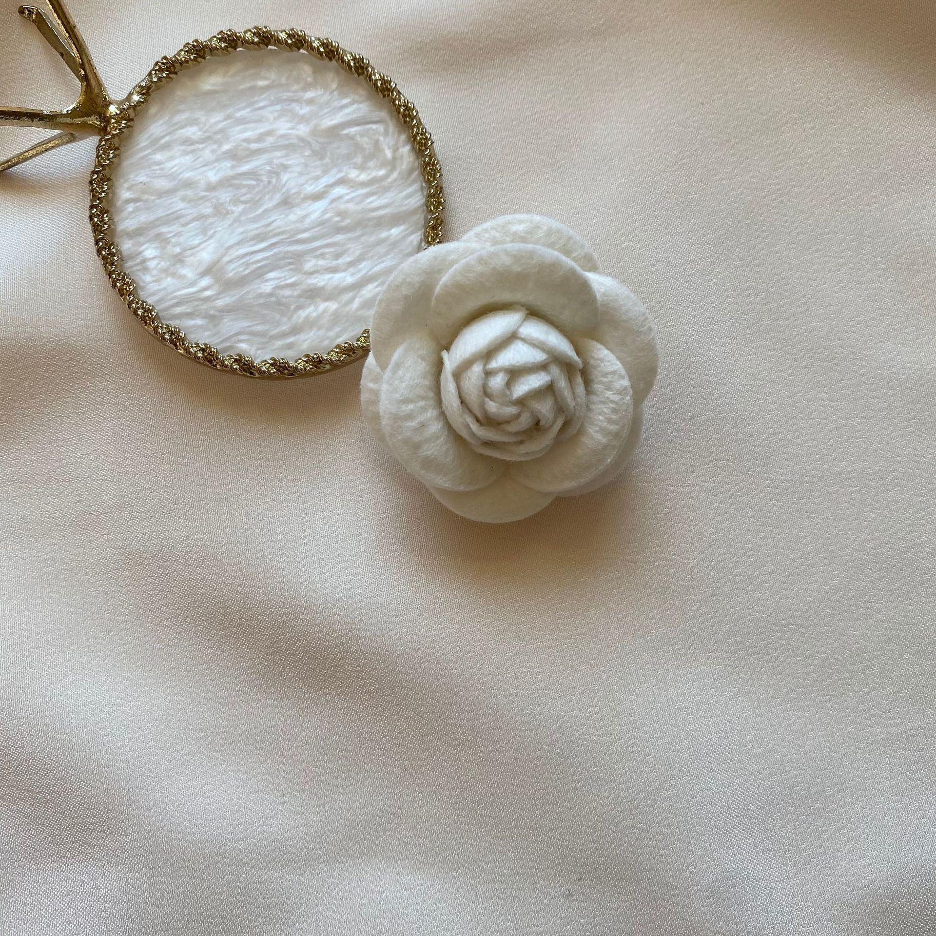 Elegant French-Style Camellia Brooch with Pearl Tie