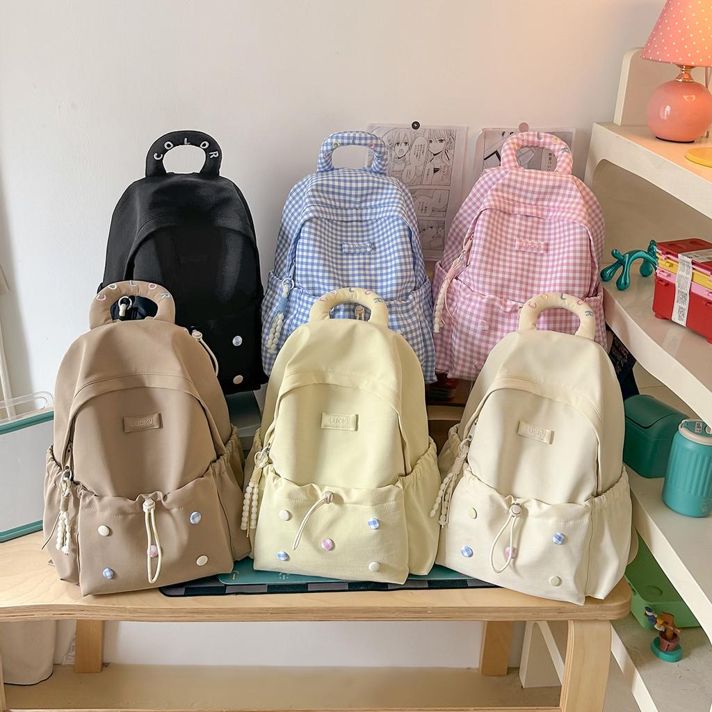 Schoolbag High-value cute girl backpack Large capacity lightweight female student schoolbag Junior high school student travel backpack