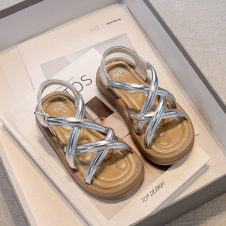 

Korean version of students girls sandals 2025 summer new fashion cross-hollowed Roman sandals children s soft-soled single shoes 37 серебряный