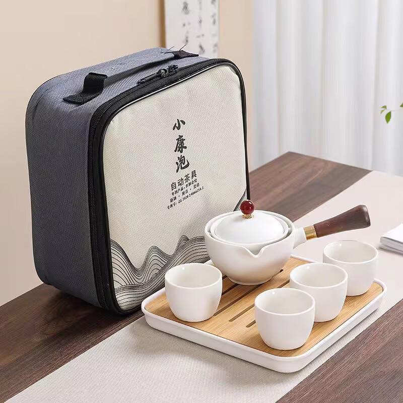 Compact Travel Tea Set with Automatic Rotating Teapot and Side Handle Kung Fu Cups