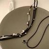 Women's Black Leather Star Necklace: Multi-Layer Clavicle Chain, Sweet and Cool Style for Chic Fashion.