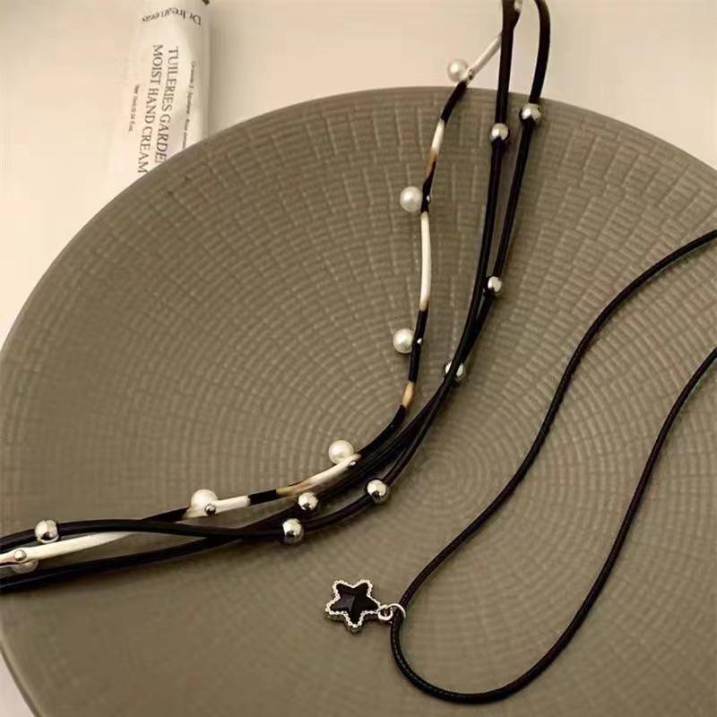 Women's Black Leather Star Necklace: Multi-Layer Clavicle Chain, Sweet and Cool Style for Chic Fashion.