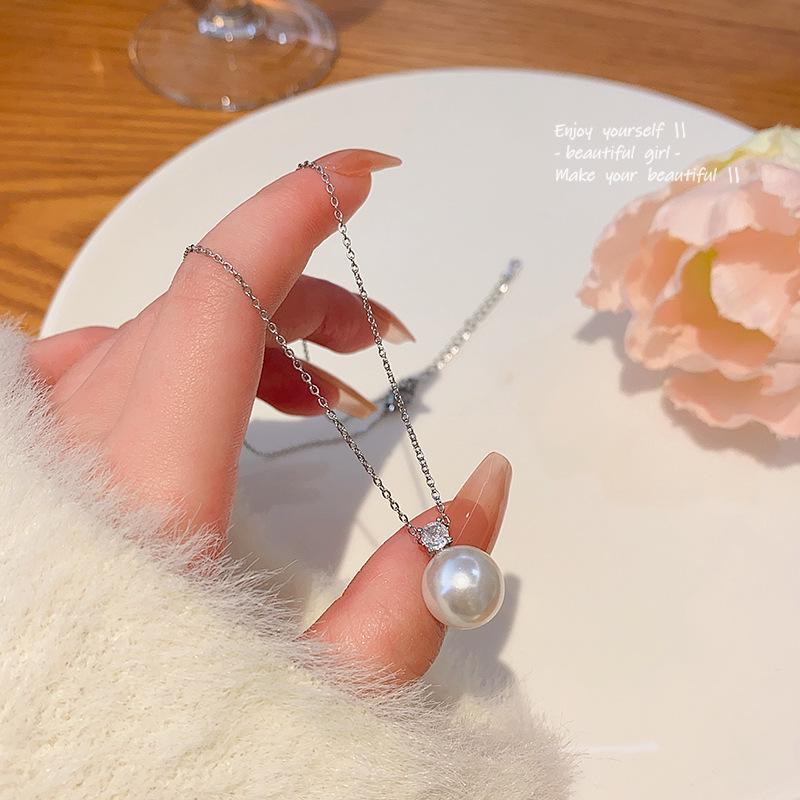 

Элегантное серое жемчужное ожерелье для женщин: Простая роскошь с цепочкой на ключицу из циркония – универсально, шикарно и в тренде X1325 серебряный