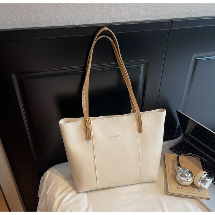 Retro casual tote bag women 2025 new commuter shoulder bag simple large capacity armpit bag