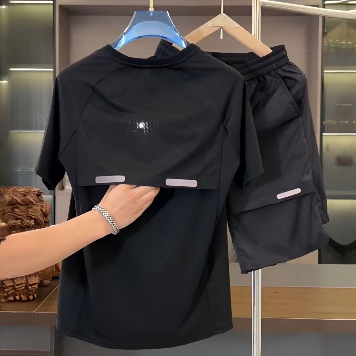 

Летний мужской дышащий перфорированный комплект из шелка Ice Silk с коротким рукавом и шортами, свободный быстросохнущий комплект из двух предметов для спорта и отдыха XS чёрный