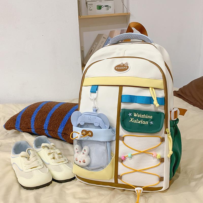 Japanese new high-value, fresh and sweet contrasting colors splicing junior high school students backpack women's lightweight backpack