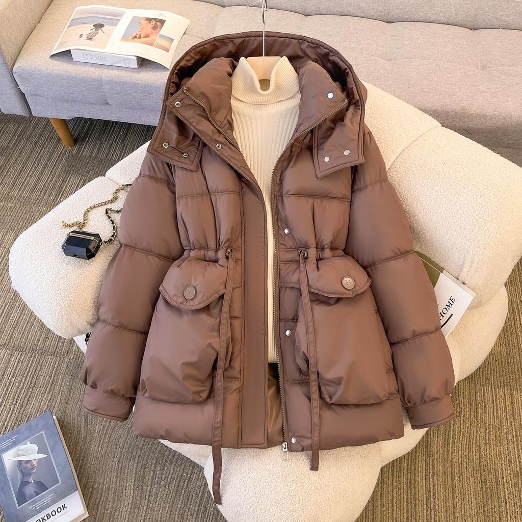 Padded clothes women's winter new long padded jackets close waist and look thin, thickened padded clothes, and thickened warm jackets.