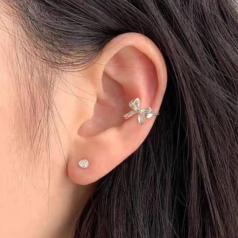 1 PERECHE Xiaoxiangfeng drăguț rafinat clip os ureche feminitate unică versatil lux ușor fundă clip ureche fără piercing
